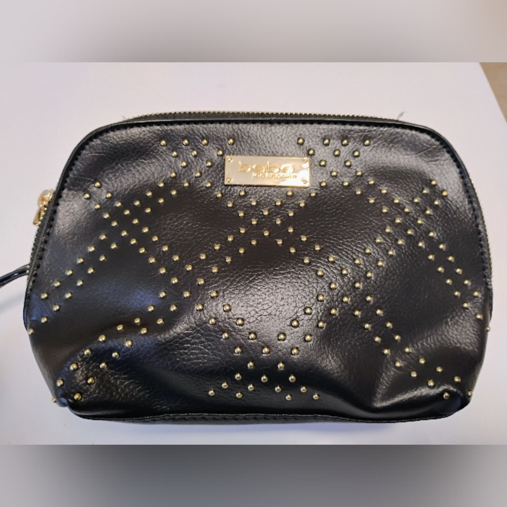Black faux leather Bebe wristlet/Clutchwith. Grunge.  Vampire Diaries. Punk.
